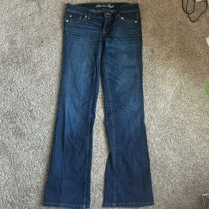 Dark blue medium to low rise American Eagle favorite boyfriend jean size 4 long